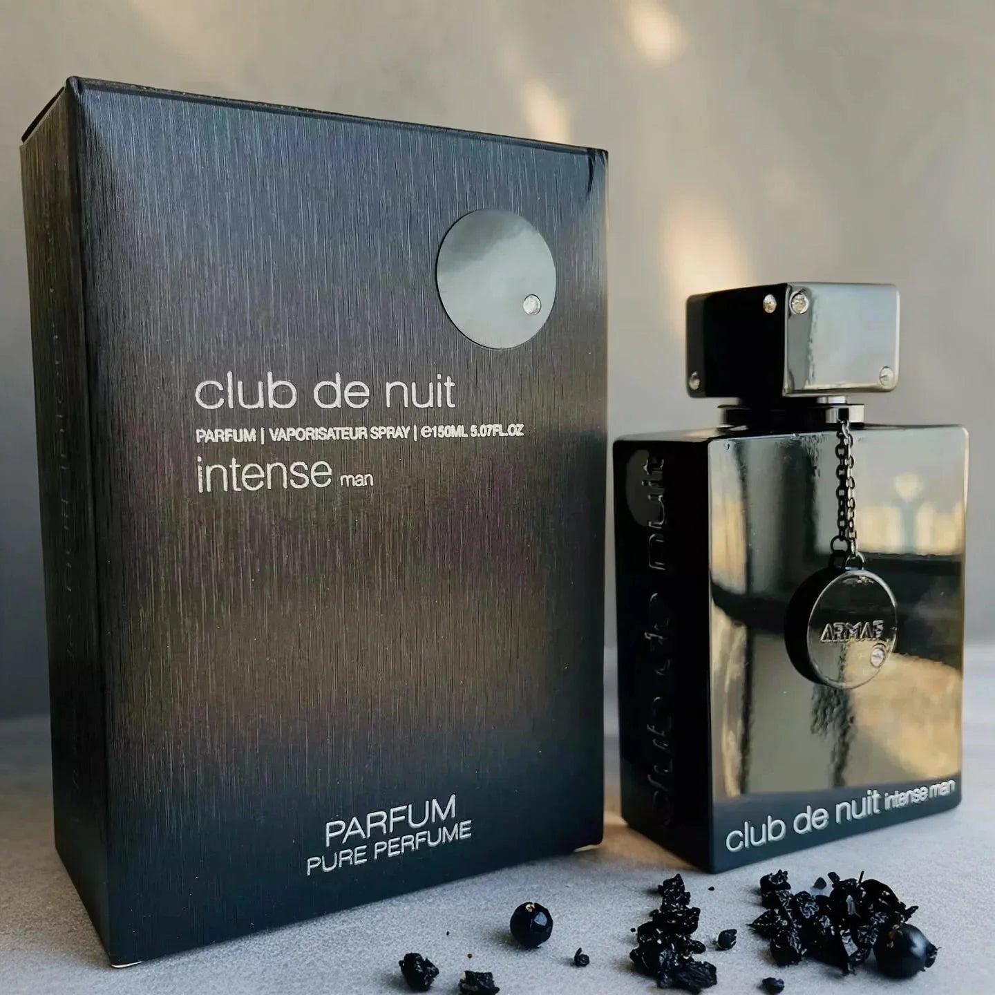 Armaf Club de Nuit Intense men's EDT perfume in black bottle, 3.4 fl oz, showcasing sleek packaging and design.