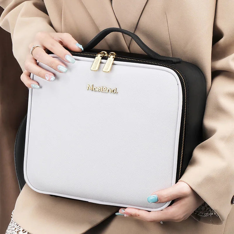Showlu LED lighted cosmetic case made of waterproof PU leather, featuring a spacious makeup bag with illuminated interior for easy access.