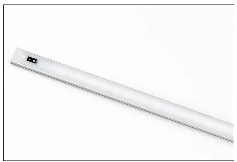 Showlu Smart General CHNAITEKE Motion Sensor LED Light mounted on wall, showcasing its sleek design and motion detection feature.
