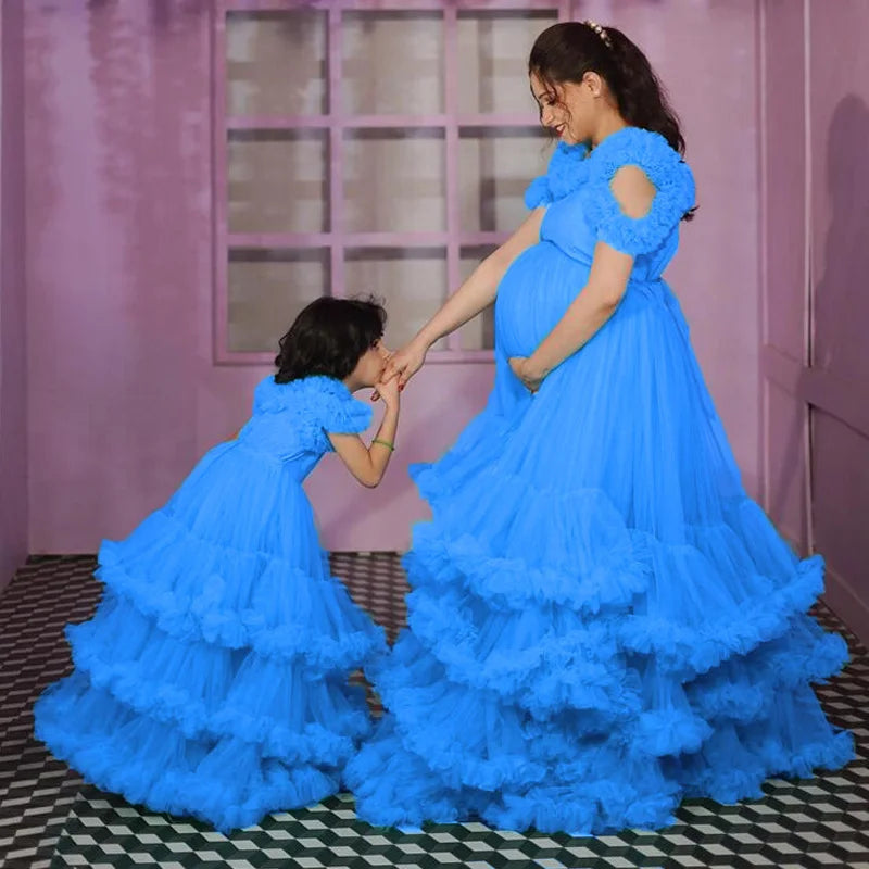Puffy mother and daughter tulle prom dresses with ruffles and tiered mesh design, perfect for baby showers and maternity events.