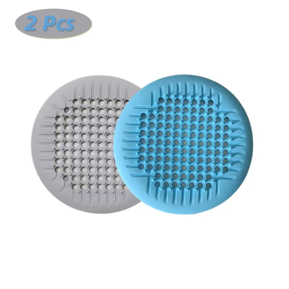 Showlu Smart General silicone drain cover fitting over sink or floor drains, flexible and durable for preventing debris blockage.