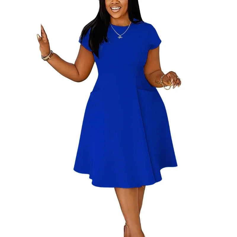 Plus size casual midi dress for women by Showlu Fashion, short sleeve, street style, oversized fit, perfect for spring and summer.