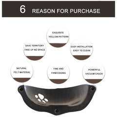 A grey felt cat window hammock with a paw print cutout and three suction cups.