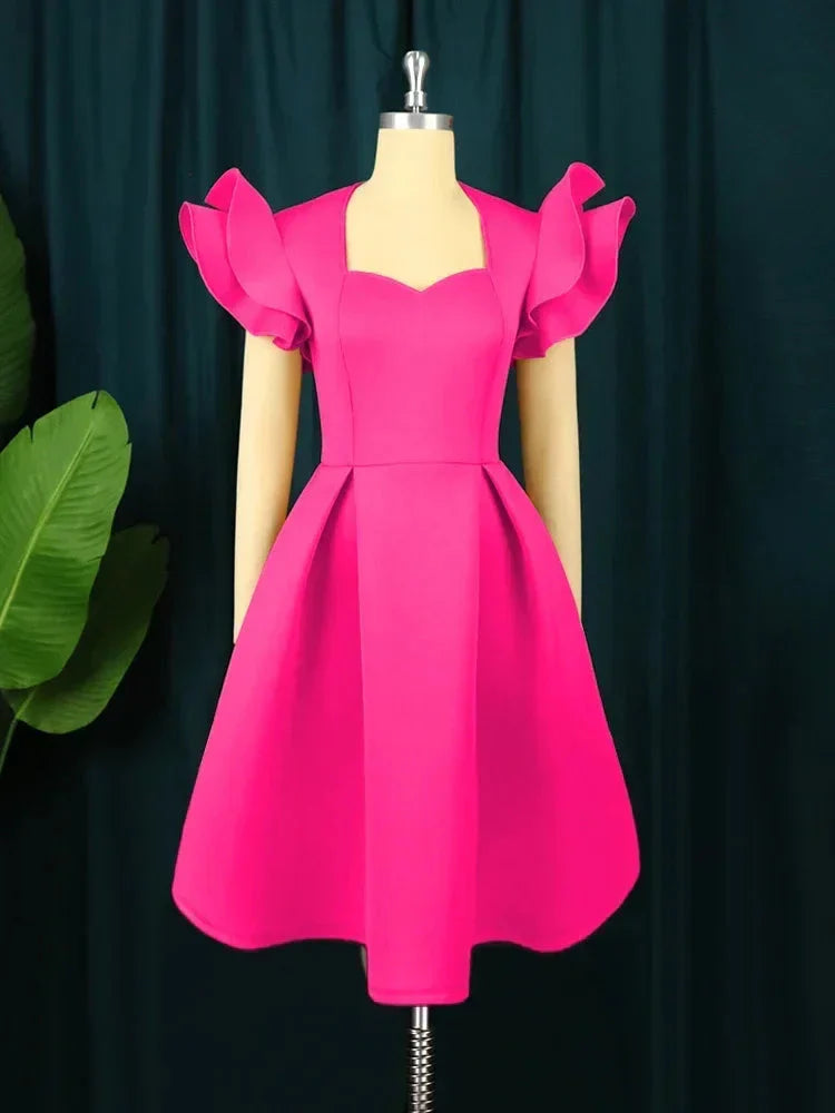 Aimei women's sweetheart neck fit and flare pleated skater dress in black, showing the dress's design and pleated skirt.