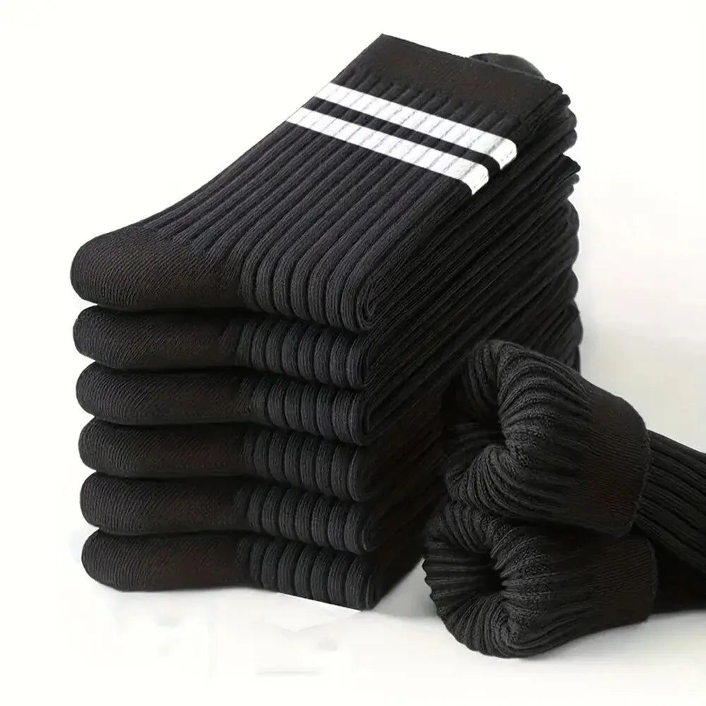 Six pairs of men's breathable black and white striped casual mid-tube socks with simple design and high-quality fabric.