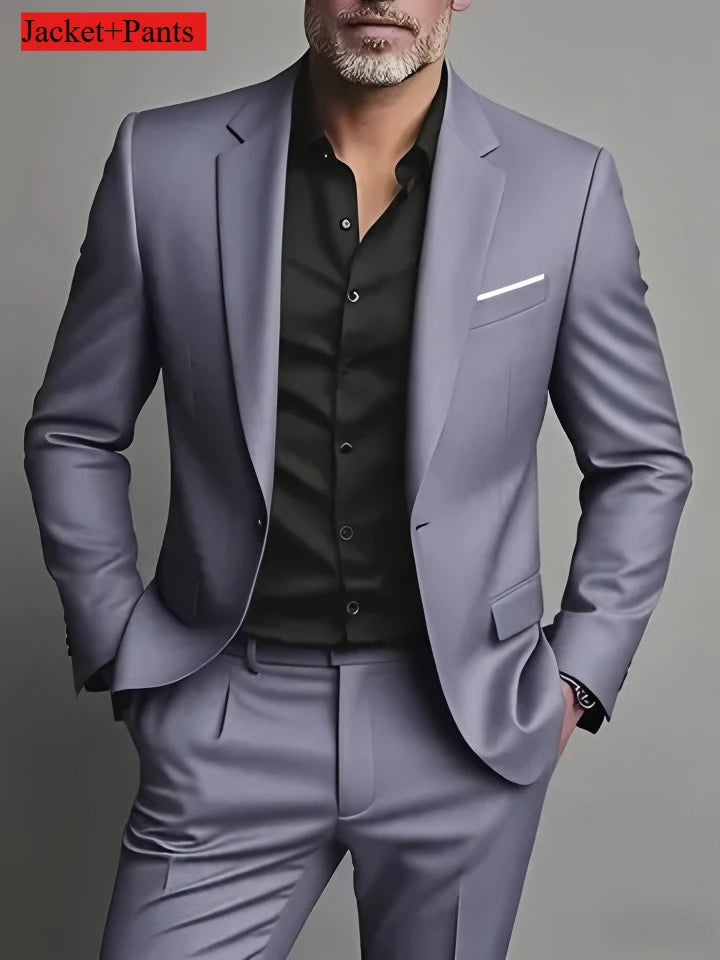 Elegant black men's slim fit tuxedo suit set for formal occasions and weddings, featuring a tailored jacket and matching trousers.