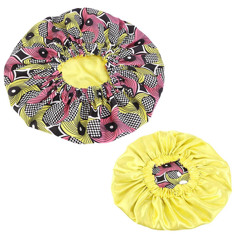 Women’s Ankara print sleep cap with satin lining, soft and extra large headwrap for hair care and comfortable nightwear.