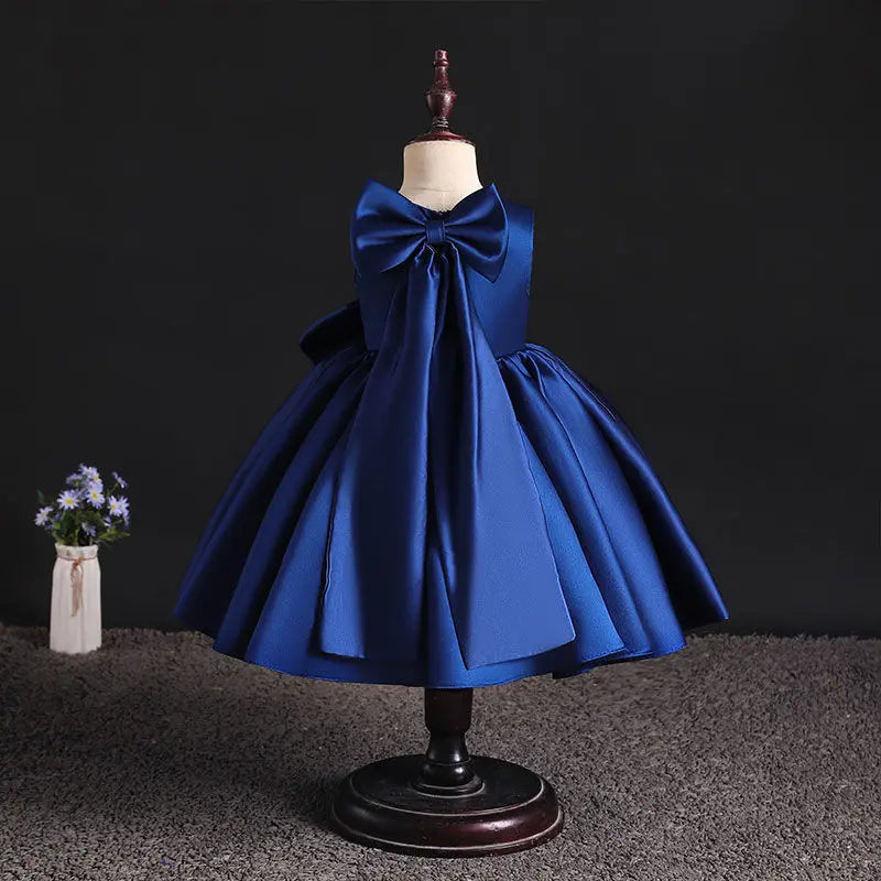 Girls' princess birthday party dress by Showlu Fashion for ages 1 to 8, featuring a festive design with a bow and elegant style.