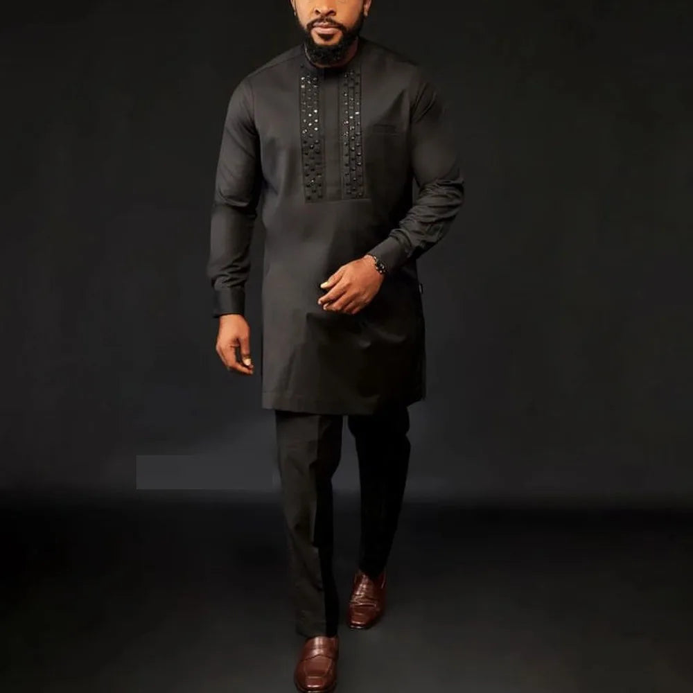 Men's white Kaunda suit by Showlu Fashion, traditional African 2-piece cotton set with intricate embroidery and classic fit.