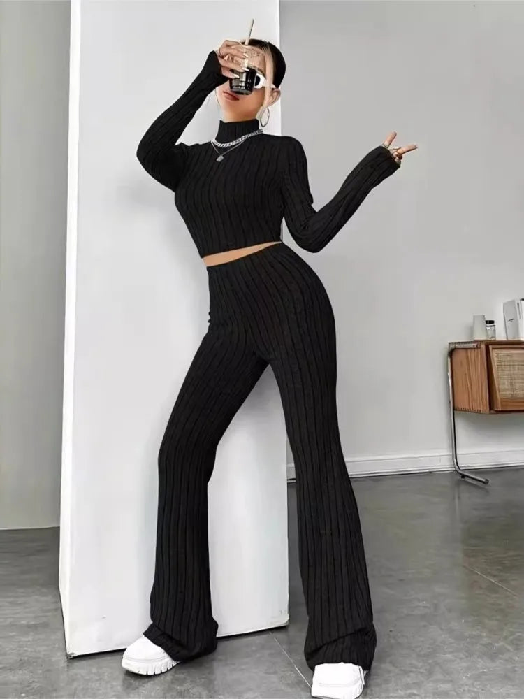Showlu Fashion Women's autumn knitted two-piece bodycon suit with long sleeve crop top and flare pants, vintage Y2K style stretch outfit.