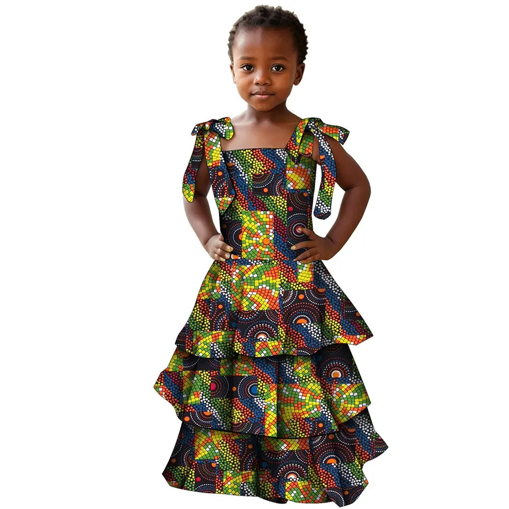 Colorful African print cotton girls' party dress in Bazin Riche style by SHOWLU FASHION STORE, featuring vibrant patterns and a stylish design.