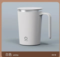 Showlu automatic self-stirring stainless steel coffee mug with magnetic stirring mechanism and ergonomic handle.