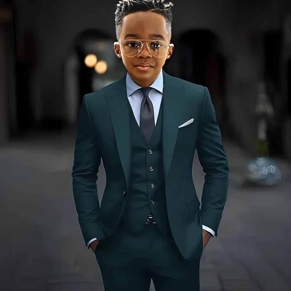 Dark grey boy suit set with slim fit, single-breasted jacket, peak lapel, pants, and vest, stylish and high quality for kids.