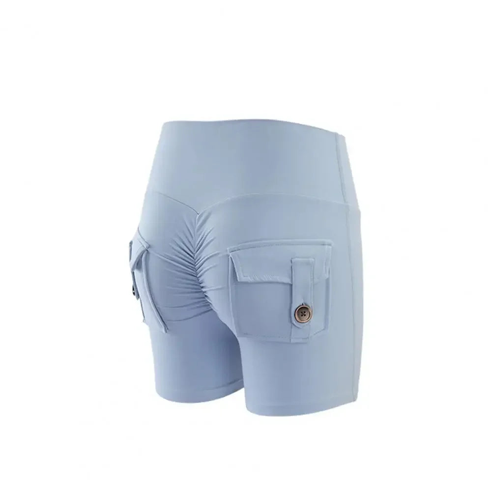 SANWOOD women's high waist peach yoga shorts with pockets, showcasing a fitted design and comfortable stretch fabric.