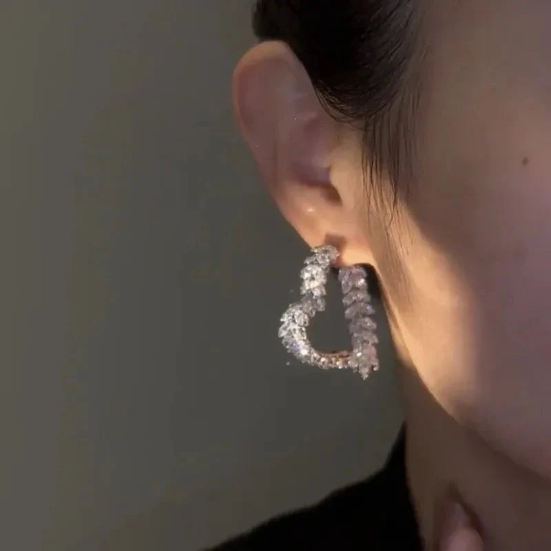 SHOWLU FASHION zircon leaf stud earrings featuring Korean style copper jewelry with intricate leaf design and sparkling zircon accents.