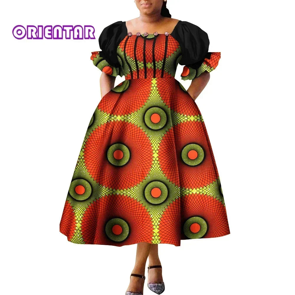 African print Ankara cotton gown with puff sleeves and high waist, designed by SHOWLU FASHION STORE.