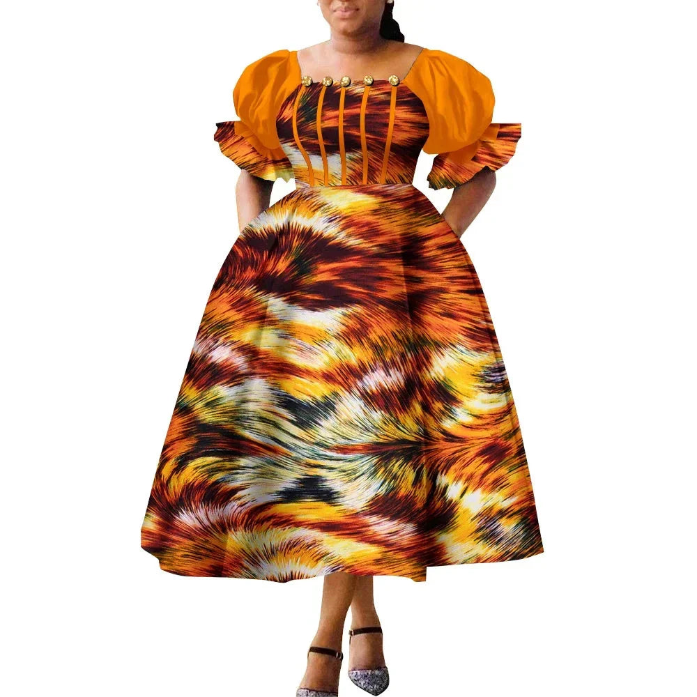 African print puff sleeve high waist Ankara cotton gown by SHOWLU FASHION STORE, showcasing vibrant traditional fabric and elegant design.