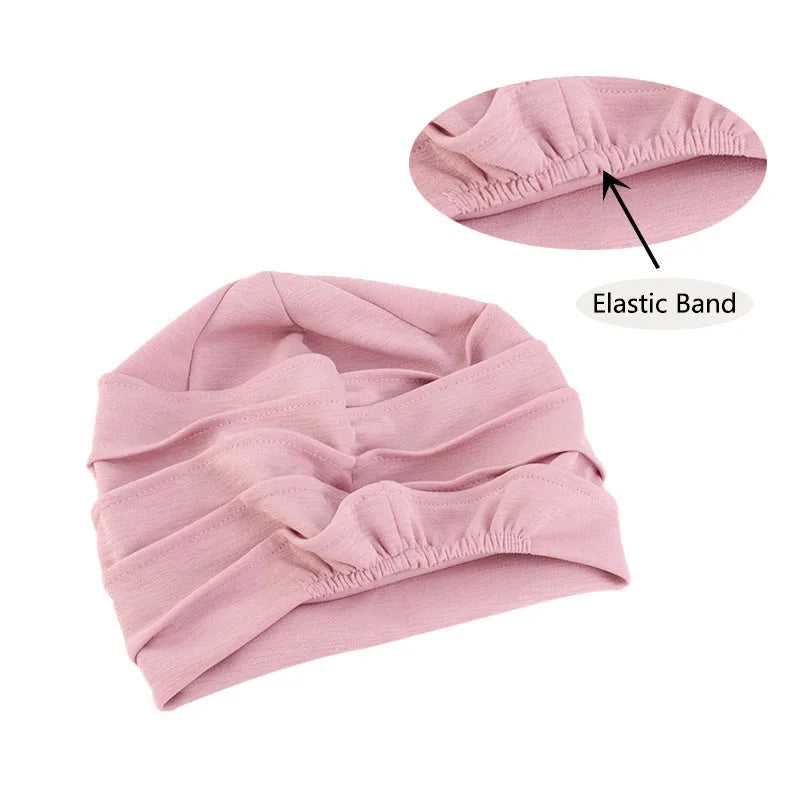 Women’s solid color turban beanie by Showlu Fashion featuring elastic headband, ideal for hair loss, chemo, or everyday wear.