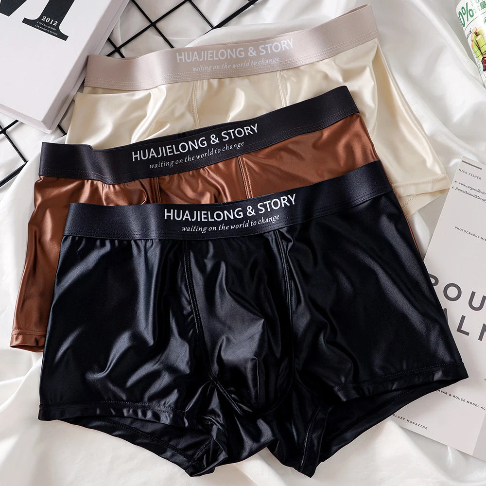 Showlu men's ice silk boxer shorts in a 3-pack, breathable mesh underwear with smooth, lightweight fabric for comfort and style.