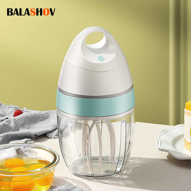 Showlu Smart General USB electric egg beater handheld mixer with mini whisk for cream and cake batter in a kitchen setting