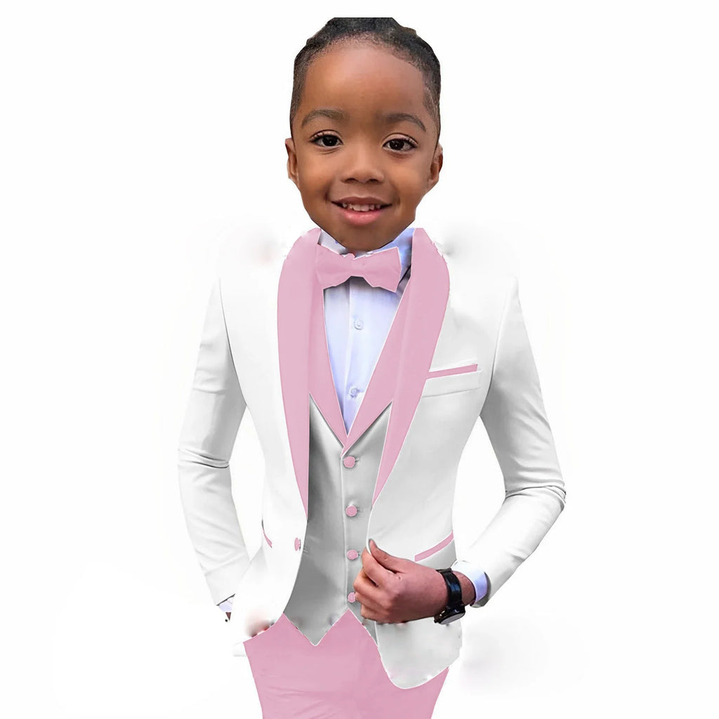 White boys' tuxedo suit with royal blue collar, 3-piece formal wedding and party outfit for kids ages 2 to 16, from Showlu Fashion.