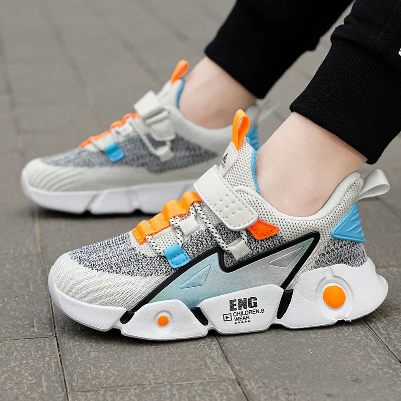 SHOWLU Girls' mesh breathable sports shoes with sporty design and cushioned soles, ideal for leisure walking and active play.