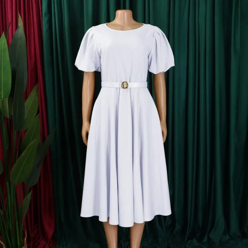 Women's puff sleeve A-line office dress with belt by SHOWLU FASHION STORE, shown in black with stylish puff sleeves and a fitted waist.