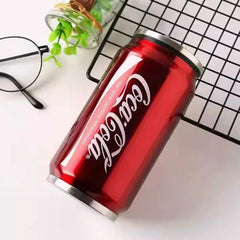 A red Coca-Cola branded stainless steel mug shaped like a soda can.