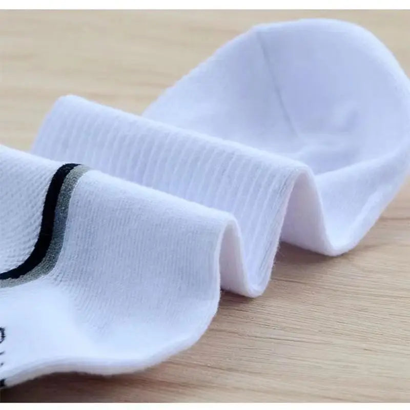 Set of men's striped sports ankle socks made of breathable cotton with sweat absorption and comfortable fit.