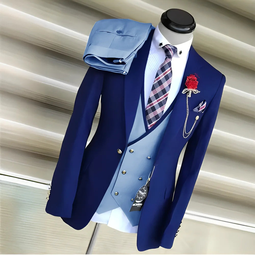 Royal blue men's 3-piece suit set with yellow tuxedo jacket, pants, and vest, ideal for wedding or formal occasions.