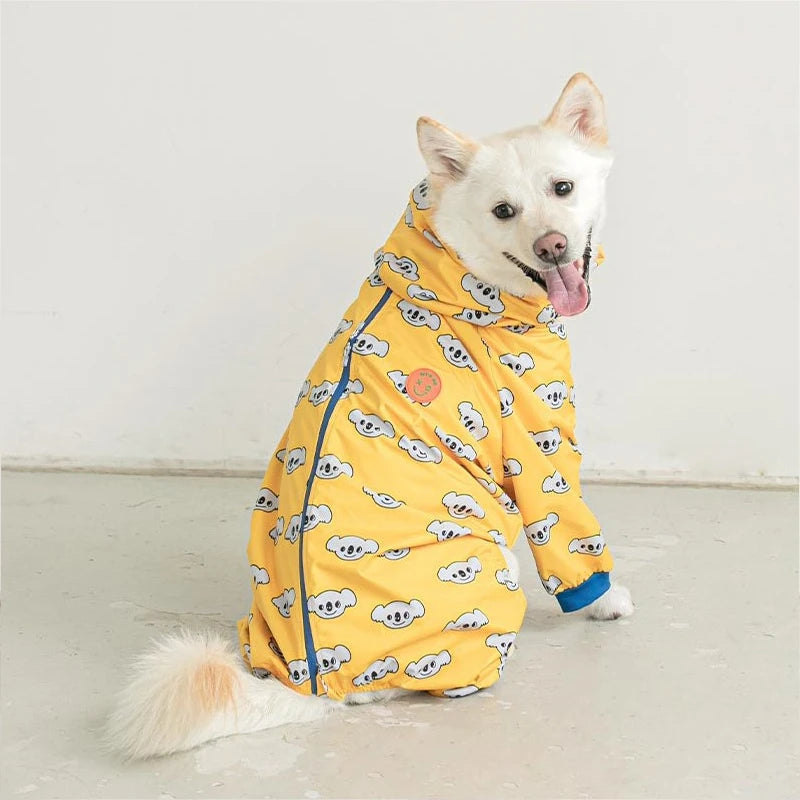 Showlu Waterproof Hooded Dog Raincoat with four-leg jacket, lightweight and protective for rainy weather outdoor walks.
