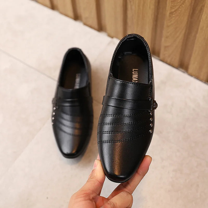 Boy's black leather British style shoes with white accents, casual performance shoes for children, made by Showlu Fashion Store.