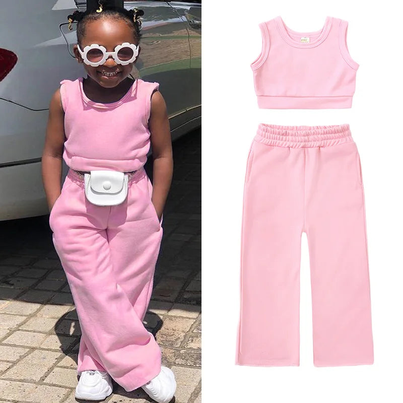 Kids Tales girls' 2-piece cotton T-shirt and pants set for ages 1-6, featuring colorful playful designs and comfortable fabric.