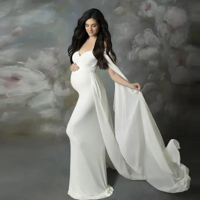 Off-shoulder maternity photography dress by Showlu Fashion Store featuring a flowing maxi gown for pregnancy photo shoots.