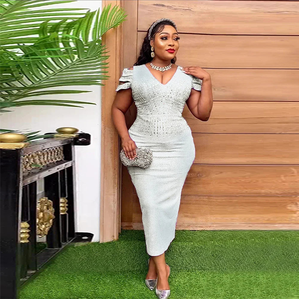 Plus size African bodycon mermaid maxi dress by SHOWLU FASHION STORE, featuring vibrant patterns and a fitted, elegant silhouette.