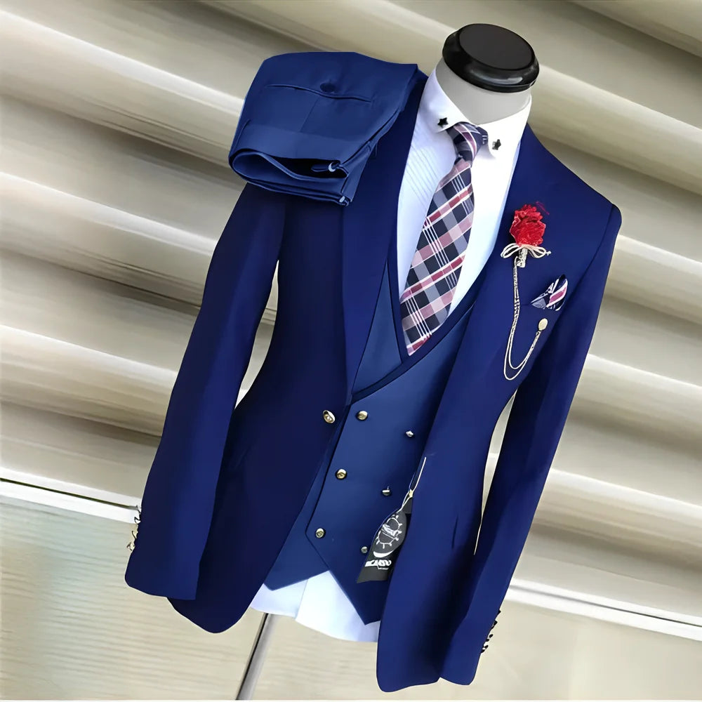 Royal blue men's 3-piece suit with yellow accents, including tuxedo jacket, pants, and vest for formal occasions