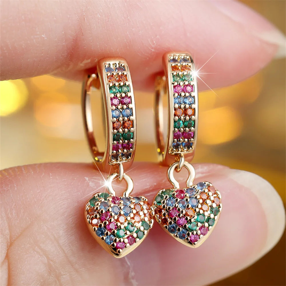 Gold-plated Showlu Rainbow Zircon Heart Hoop Earrings featuring colorful crystal accents and a heart-shaped design.