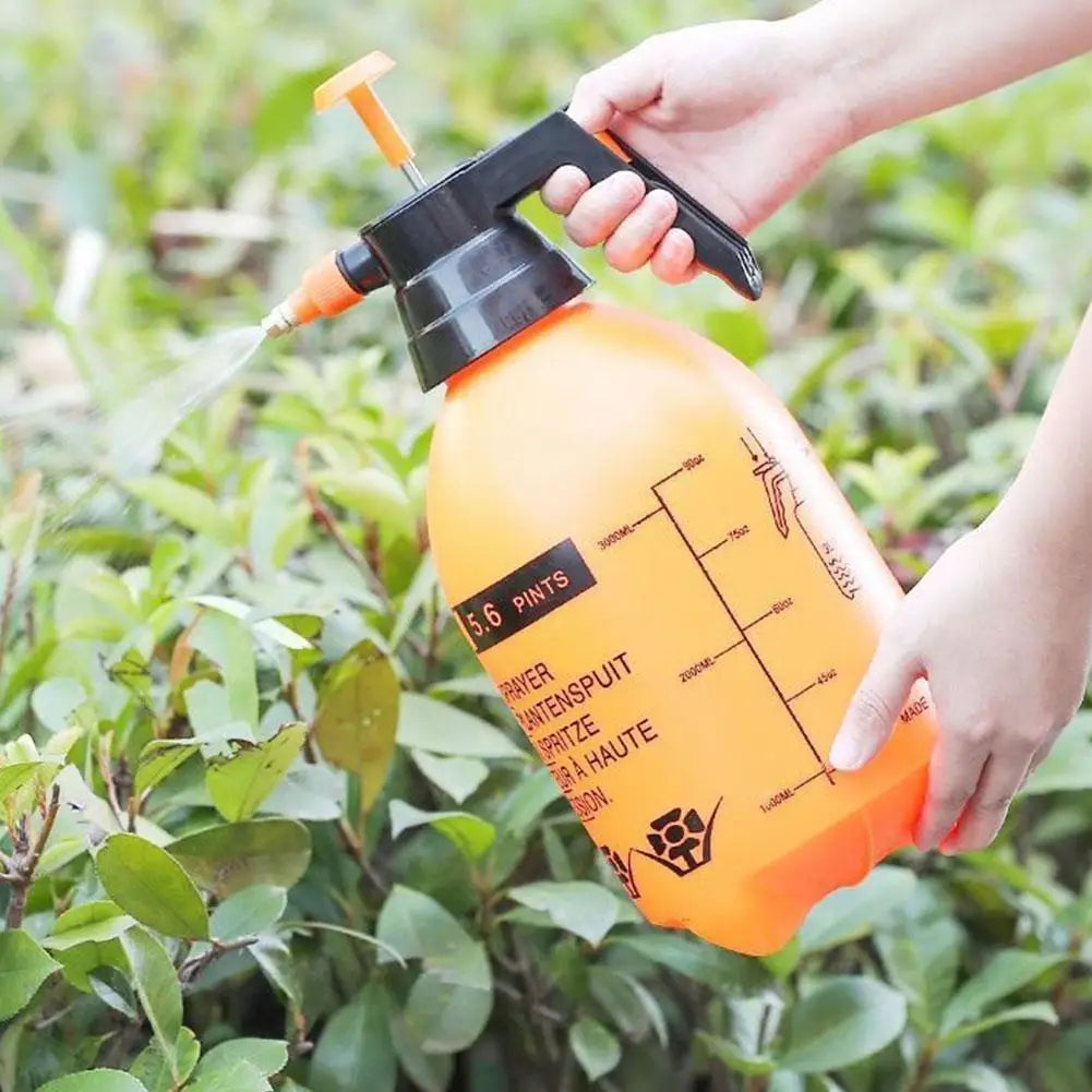 Showlu Smart General high pressure spray bottle with ergonomic handle and transparent body for garden or cleaning use.