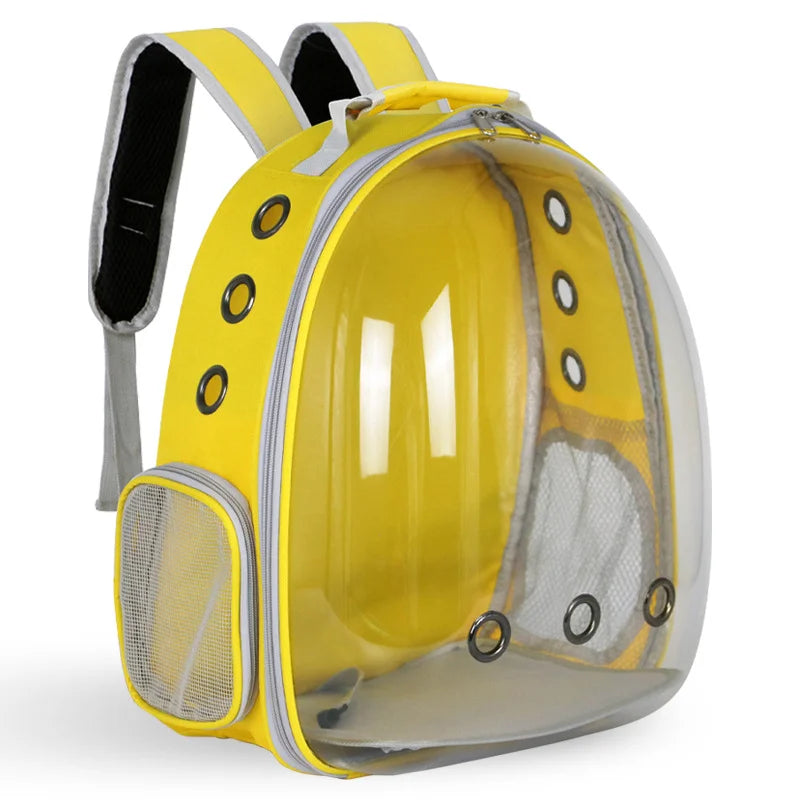 A yellow pet backpack carrier with a transparent front shell and mesh side ventilation panels.