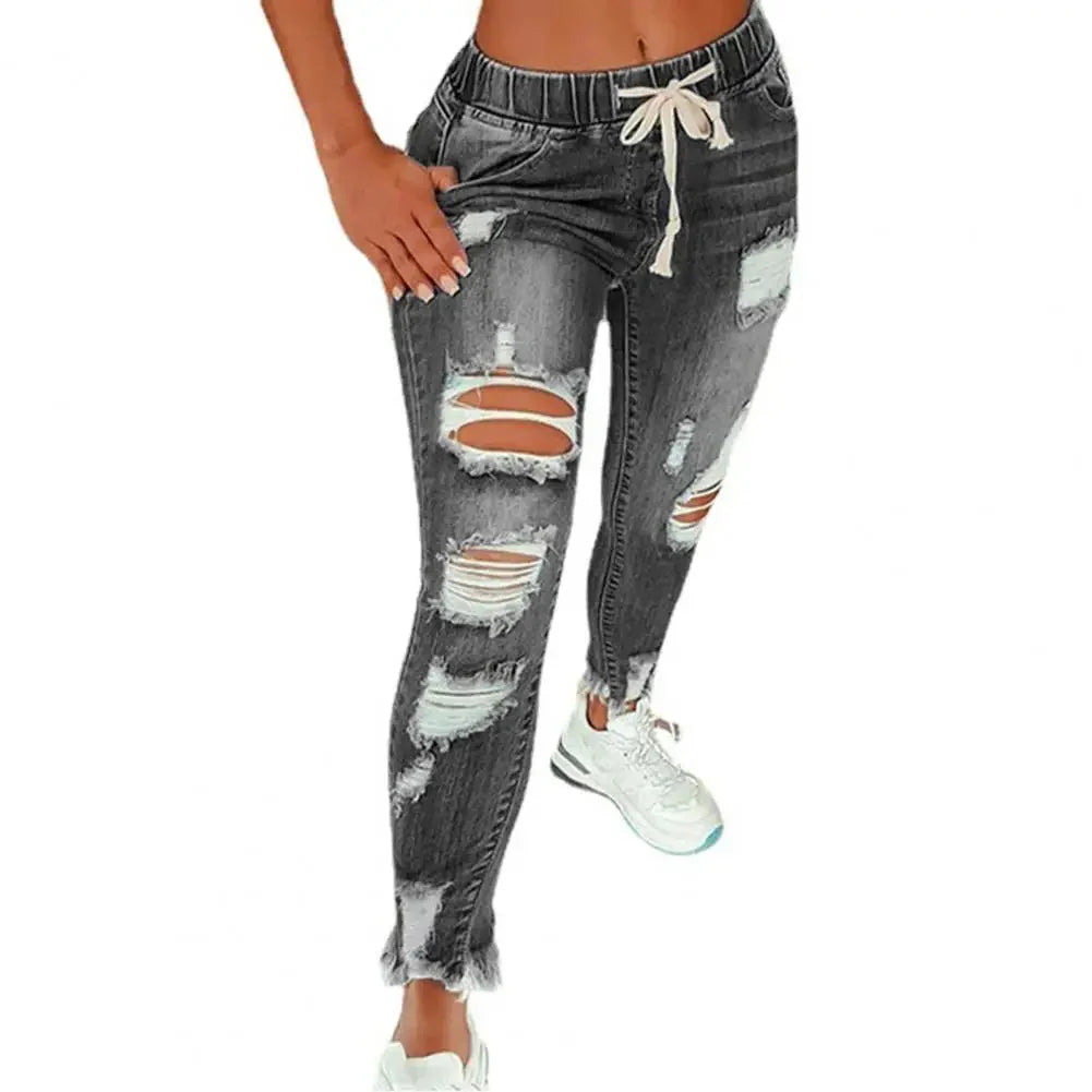 Women's ripped hole stretchy skinny jeans by SANWOOD, high waist denim pants with a fitted, stylish design.