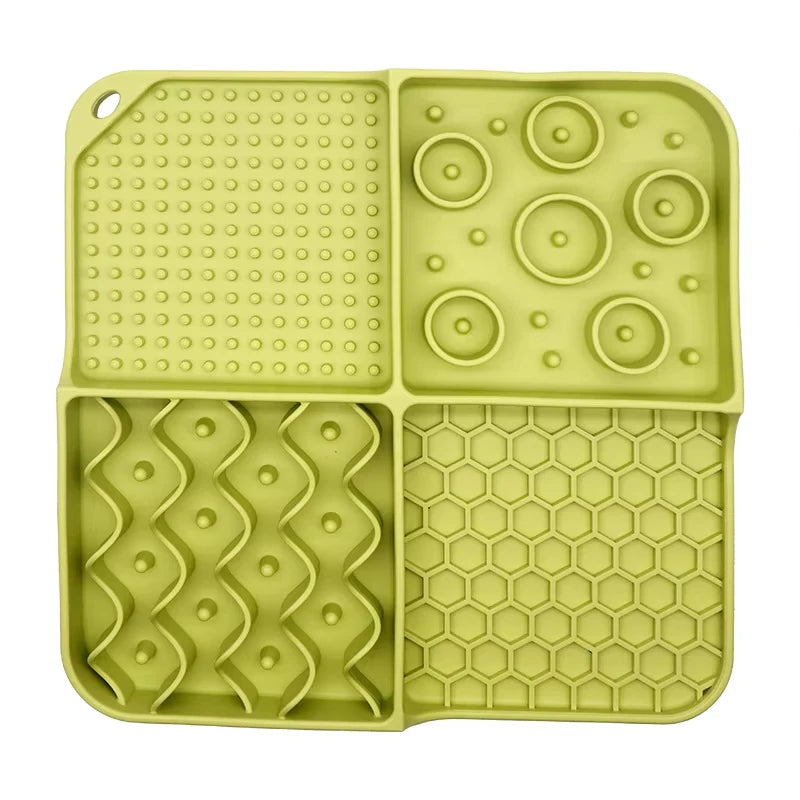 Turquoise slow feeder pet mat made of non-toxic silicone with an aluminum bowl, designed to reduce boredom and anxiety in pets.
