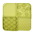 Turquoise slow feeder pet mat made of non-toxic silicone with an aluminum bowl, designed to reduce boredom and anxiety in pets.