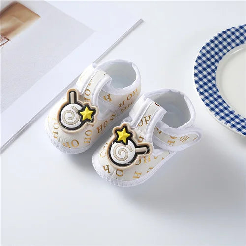 Soft cotton baby first walkers for boys and girls, showing small newborn shoes with colorful designs and comfortable fit.
