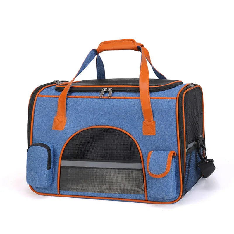 A blue and orange soft-sided pet carrier with mesh windows and zipper closures.