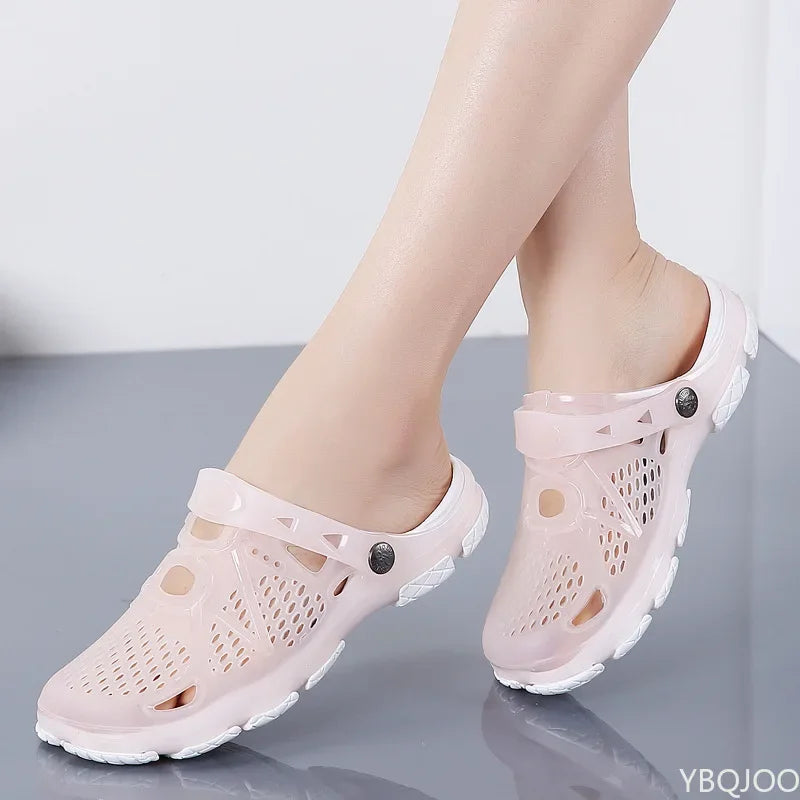 Showlu Women's casual jelly sandals, flat water shoes perfect for outdoor beach and water activities, in a vibrant transparent design.