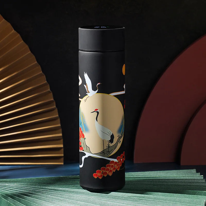 Stainless steel vacuum thermos bottle by Showlu Smart General, sleek design with a secure lid for hot and cold beverages.
