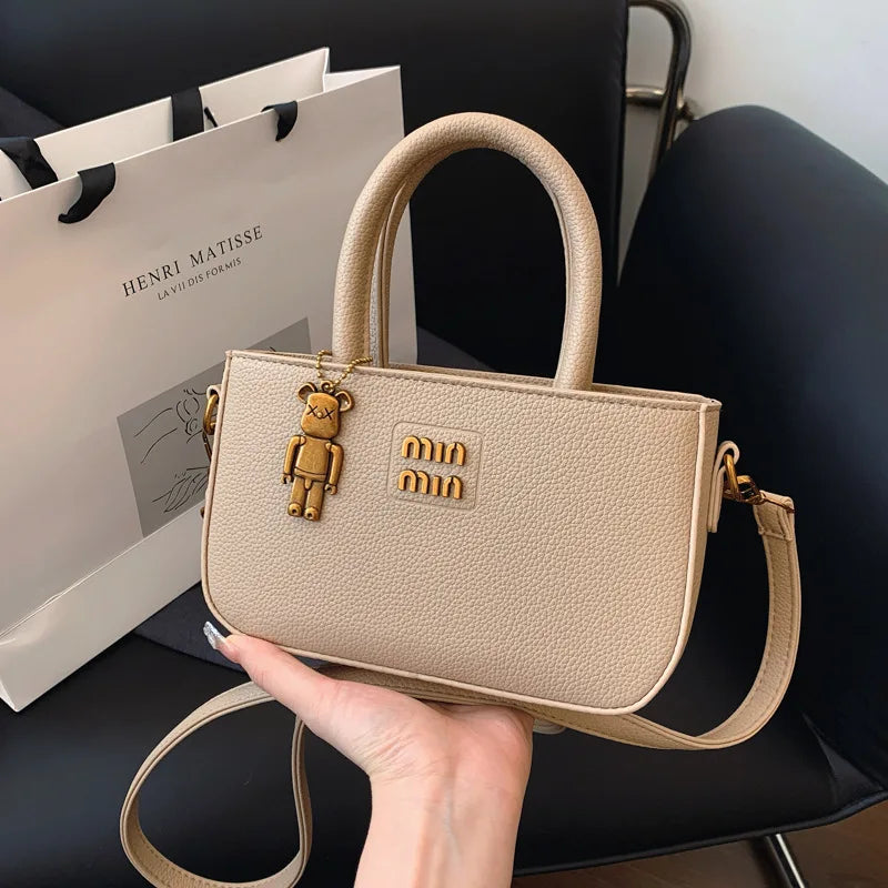 Luxury minimalist phone pouch and crossbody bag by 1170uf-he, sleek design in neutral tones, perfect for everyday carry.