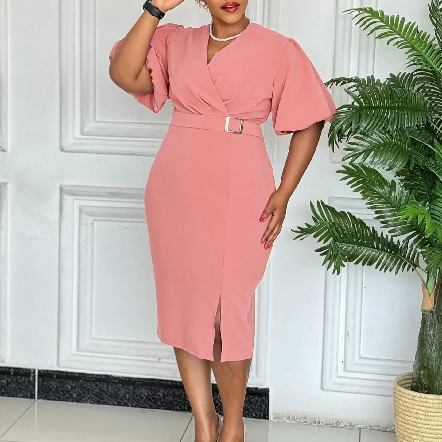Elegant African dashiki dress for women featuring short sleeves, V-neck, and bodycon fit, made of polyester for summer wear.