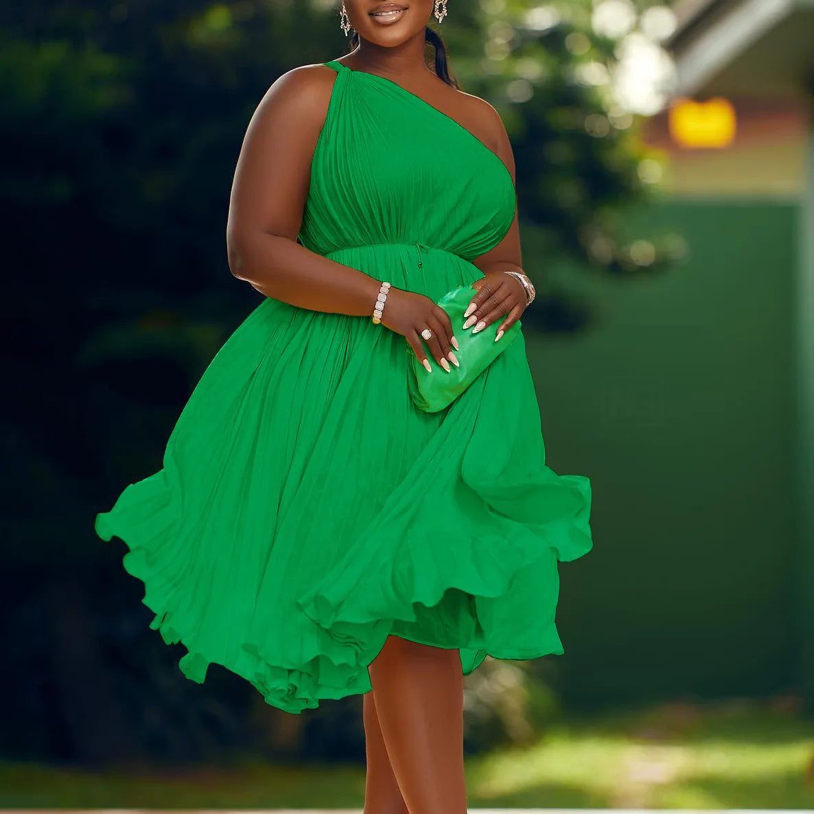 Women’s one-shoulder sleeveless pleated knee-length swing dress by Showlu Fashion, stylish and chic for 2023 fashion trends.