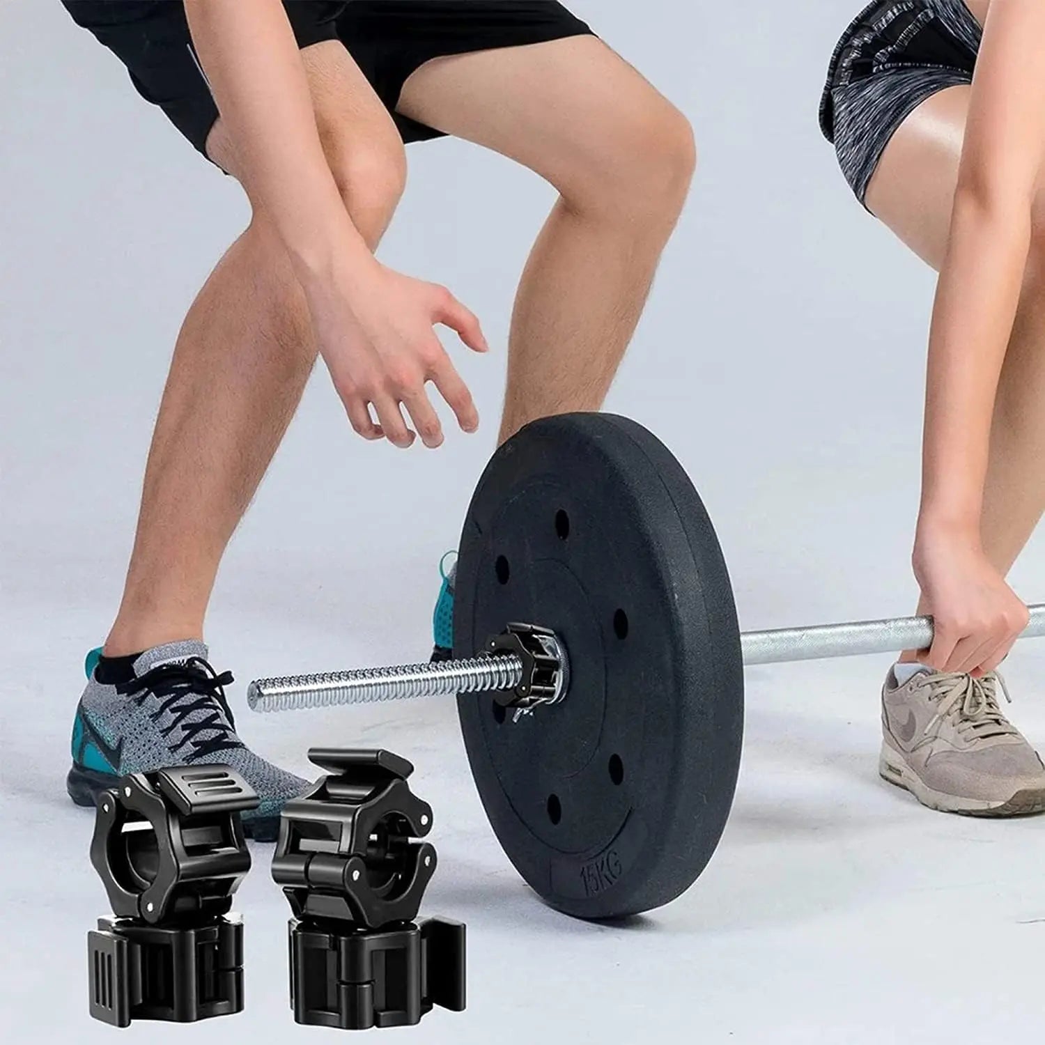Pair of Showlu Fashion Store quick release barbell clamps with spin lock for weightlifting and strength training.